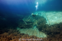 Diving in a freshwater spring by Michael Baukloh 